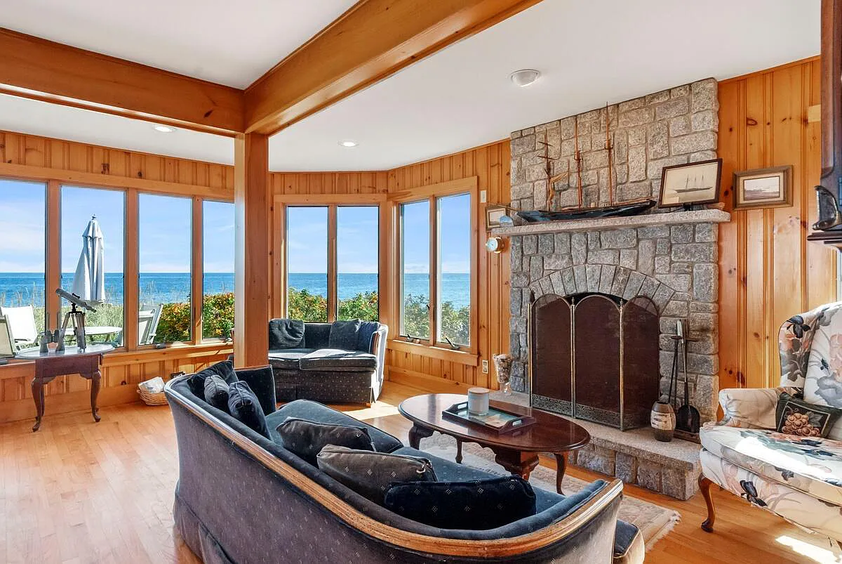 the inside of the living room, picturing the fireplace